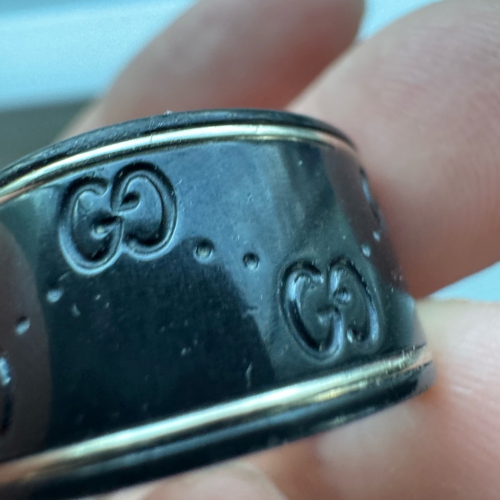 Gucci Black Ring with Gold Detailing